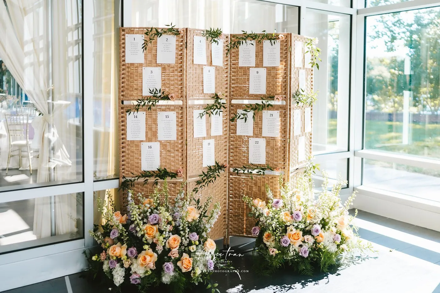 An escort card display set up on wedding morning