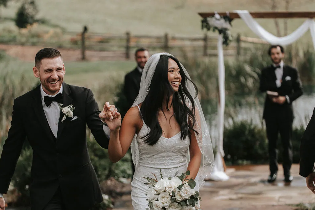 A couple celebrating at their ceremony